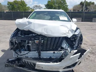 2020 Cadillac XT5 Premium Luxury FWD with VIN 1GYKNCRS7LZ129119, listed as a IAAI auction lot 41710878 with 52,575 mi miles and . Bid and sale history available at carsss.com. Image 12.