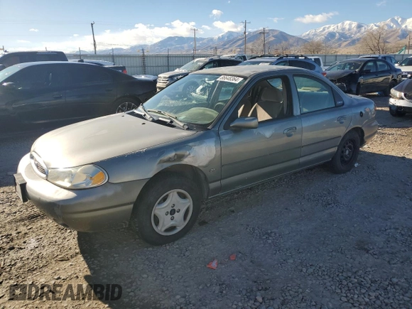 1998 Ford Contour z VIN 1FAFP66Z5WK232756, wystawiony jako Copart lot #86648364 z przebiegiem 118 176 mil mil oraz Tytuł czysty. Historia ofert i sprzedaży dostępna na DreamBid. Obrazek 1.