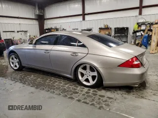2007 Mercedes-Benz CLS-Class 5.5L with VIN WDDDJ72X77A084281, listed as a Copart auction lot 51673165 with 248,113 mi miles and Salvage Title. Bid and sale history available at carsss.com. Image 2.