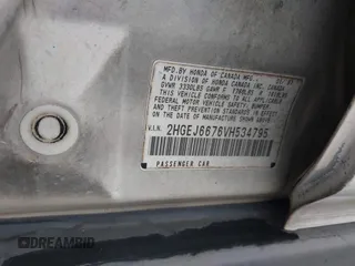 1997 Honda Civic LX z VIN 2HGEJ6676VH534795, wystawiony jako IAAI lot #42170378 z przebiegiem 228 033 mil mil oraz . Historia ofert i sprzedaży dostępna na DreamBid. Obrazek 9.