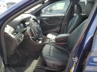 2020 BMW X1 xDrive28i with VIN WBXJG9C0XL5R33141, listed as a Copart auction lot 63040155 with 165,172 mi miles and Clean title. Bid and sale history available at DreamBid. Image 7.