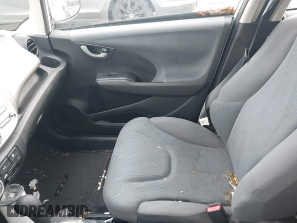 2013 Honda Fit with VIN JHMGE8H39DC005052, listed as a IAAI auction lot 41008236 with 124,874 mi miles. Bid and sale history available at carsss.com. Image 5.