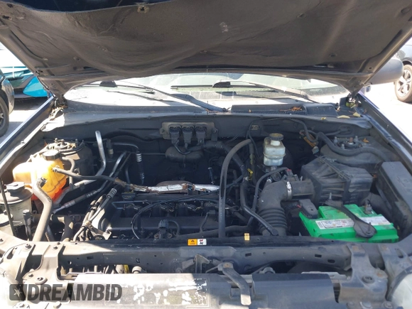 2005 Ford Escape XLS Value with VIN 1FMYU02Z85KD90338, listed as a IAAI auction lot 41916569 with 174,870 mi miles. Bid and sale history available at carsss.com. Image 10.