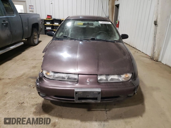 1998 Saturn SW z VIN 1G8ZK8271WZ165967, wystawiony jako Copart lot #73493044 z przebiegiem Nie podano mil oraz Szkoda całkowita • Salvage title. Historia ofert i sprzedaży dostępna na DreamBid. Obrazek 5.