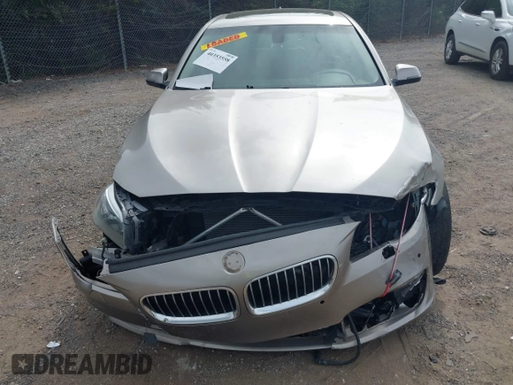 2014 BMW 5 Series 528i xDrive with VIN WBA5A7C56ED613949, listed as a IAAI auction lot 40353558 with 94,672 mi miles and . Bid and sale history available at DreamBid. Image 13.