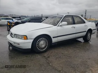 1991 Acura Legend L with VIN JH4KA7660MC022237, listed as a Copart auction lot 48401315 with 97,776 mi miles and Salvage Title. Bid and sale history available at DreamBid. Image 1.
