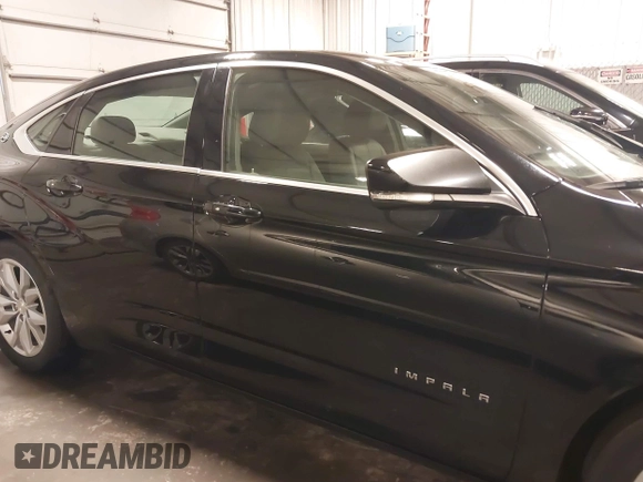 2018 Chevrolet Impala LT with VIN 1G1105S32JU122113, listed as a IAAI auction lot 42042957 with 152,895 mi miles and . Bid and sale history available at DreamBid. Image 14.