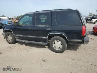 1999 Chevrolet Tahoe Z71 with VIN 1GNEK13R6XJ411348, listed as a Copart auction lot 71179204 with 162,752 mi miles and Salvage Title. Bid and sale history available at carsss.com. Image 2.