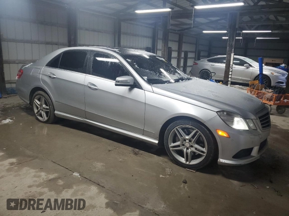 2011 Mercedes-Benz E 550 Luxury with VIN WDDHF9AB7BA329836, listed as a Copart auction lot 56371885 with 245,527 mi miles and Salvage title. Bid and sale history available at DreamBid. Image 4.