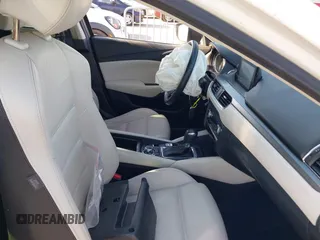 2016 Mazda Mazda6 i Grand Touring with VIN JM1GJ1W54G1456737, listed as a IAAI auction lot 41841001 with 114,870 mi miles. Bid and sale history available at carsss.com. Image 5.