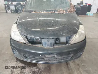 2007 Nissan Versa SL с VIN 3N1BC11E97L430772, выставлен на аукционе IAAI как лот 42497978 с пробегом 174 151 миль миль и . История ставок и продаж доступна на DreamBid. Изображение 6.