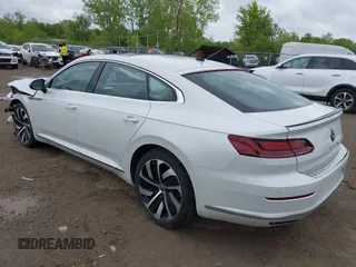 2021 Volkswagen Arteon SEL R-Line z VIN WVWSR7AN6ME007156, wystawiony jako IAAI lot #42254735 z przebiegiem 32 004 mil mil oraz . Historia ofert i sprzedaży dostępna na DreamBid. Obrazek 3.