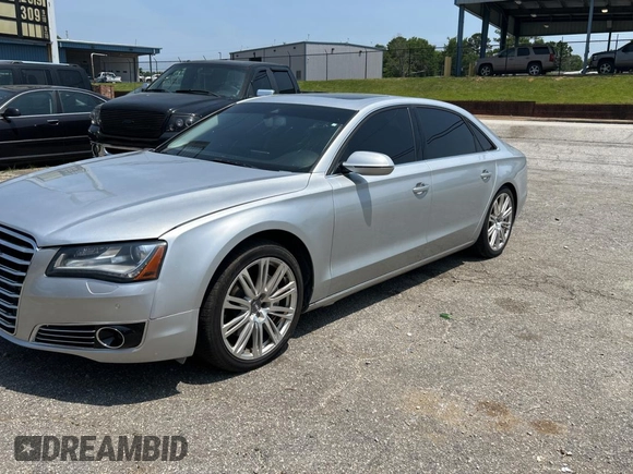 2013 Audi A8 3.0L with VIN WAURGAFD6DN010072, listed as a Copart auction lot 57999295 with 116,555 mi miles and Salvage title. Bid and sale history available at DreamBid. Image 2.