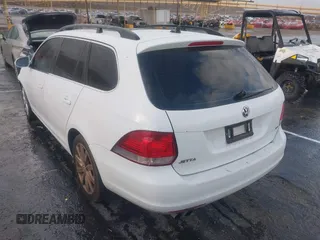 2014 Volkswagen Jetta SportWagen TDI with VIN 3VWPL7AJ4EM621328, listed as a IAAI auction lot 41510857 with 144,304 mi miles. Bid and sale history available at carsss.com. Image 3.