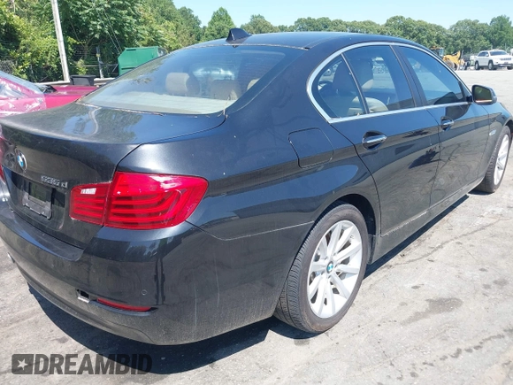 2014 BMW 5 Series 535d with VIN WBAXA5C52ED689410, listed as a IAAI auction lot 42554790 with 136,744 mi miles and . Bid and sale history available at DreamBid. Image 4.