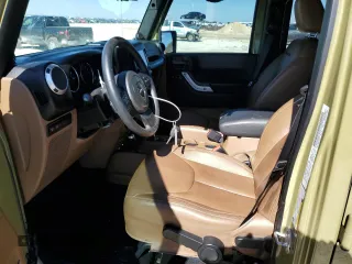 2013 Jeep Wrangler Unlimited Rubicon with VIN 1C4HJWFG1DL676131, listed as a Copart auction lot 42368085 with 76,038 mi miles and Salvage Title. Bid and sale history available at carsss.com. Image 7.
