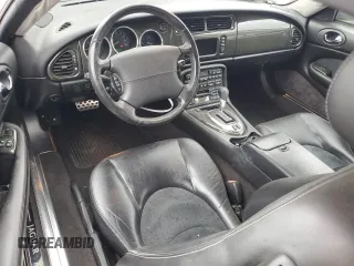2006 Jaguar XK with VIN SAJDA42C462A44968, listed as a Copart auction lot 75758524 with 77,266 mi miles and Salvage Title. Bid and sale history available at carsss.com. Image 8.