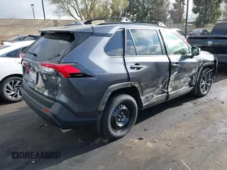2024 Toyota RAV4 Hybrid XLE Premium with VIN JTMB6RFV2RD138594, listed as a IAAI auction lot 41885310 with 12,330 mi miles. Bid and sale history available at carsss.com. Image 4.