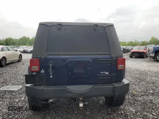 2013 Jeep Wrangler Sport with VIN 1C4AJWAG6DL590922, listed as a Copart auction lot 53379755 with 139,099 mi miles and Salvage title. Bid and sale history available at DreamBid. Image 6.