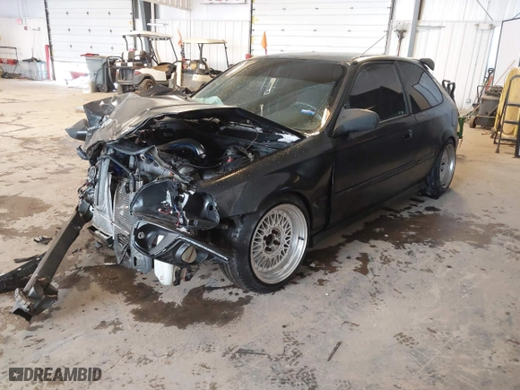 1999 Honda Civic DX with VIN 2HGEJ6448XH111972, listed as a IAAI auction lot 41556969 with 261,095 mi miles. Bid and sale history available at carsss.com. Image 17.