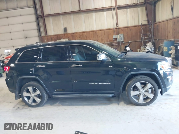 2014 Jeep Grand Cherokee Limited z VIN 1C4RJFBG2EC320282, wystawiony jako IAAI lot #42067273 z przebiegiem 78 061 mil mil oraz . Historia ofert i sprzedaży dostępna na DreamBid. Obrazek 13.