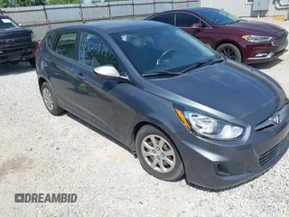 2013 Hyundai Accent GS z VIN KMHCT5AE7DU094139, wystawiony jako IAAI lot #42312906 z przebiegiem 160 146 mil mil oraz . Historia ofert i sprzedaży dostępna na DreamBid. Obrazek 1.