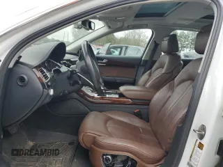 2014 Audi A8 3.0T z VIN WAURGAFD3EN003758, wystawiony jako Copart lot #47636885 z przebiegiem 166 990 mil mil oraz Szkody całkowita. Historia ofert i sprzedaży dostępna na DreamBid. Obrazek 7.