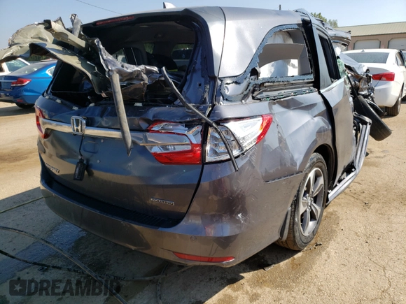2019 Honda Odyssey Touring with VIN 5FNRL6H89KB079197, listed as a Copart auction lot 57996861 with Not provided miles and Non repairable. Bid and sale history available at DreamBid. Image 4.