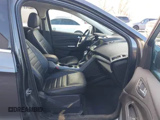 2015 Ford Escape SE with VIN 1FMCU9G98FUA70885, listed as a IAAI auction lot 41608240 with 54,802 mi miles. Bid and sale history available at carsss.com. Image 5.