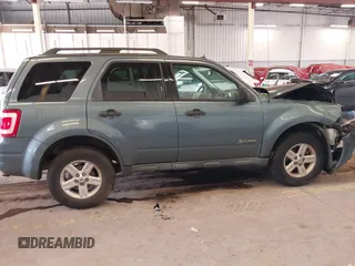 2011 Ford Escape Hybrid with VIN 1FMCU4K31BKC63987, listed as a IAAI auction lot 41987374 with 111,568 mi miles and . Bid and sale history available at DreamBid. Image 14.