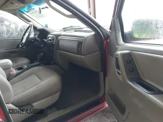 2004 Jeep Grand Cherokee z VIN 1J8GX48SX4C329289, wystawiony jako IAAI lot #41631610 z przebiegiem 212 362 mil mil oraz . Historia ofert i sprzedaży dostępna na DreamBid. Obrazek 5.