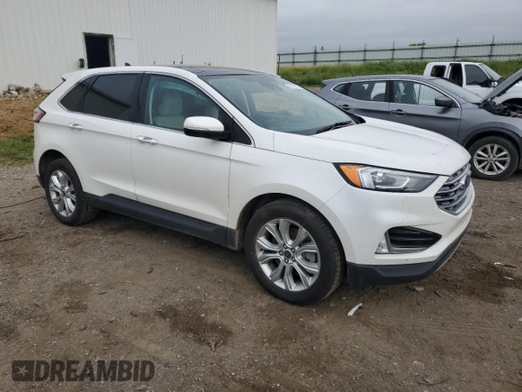2021 Ford Edge Titanium with VIN 2FMPK4K90MBA34404, listed as a Copart auction lot 61762715 with 45,102 mi miles and Salvage title. Bid and sale history available at DreamBid. Image 4.