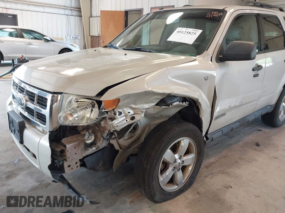2008 Ford Escape XLT with VIN 1FMCU93198KE17879, listed as a IAAI auction lot 40125825 with 214,373 mi miles and . Bid and sale history available at DreamBid. Image 6.
