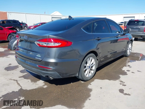 2020 Ford Fusion SE with VIN 3FA6P0HD3LR136288, listed as a IAAI auction lot 41699942 with 99,409 mi miles. Bid and sale history available at carsss.com. Image 4.