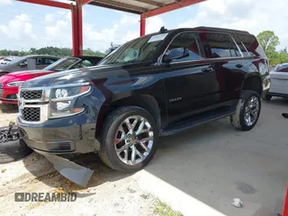2019 Chevrolet Tahoe LT z VIN 1GNSKBKCXKR361392, wystawiony jako IAAI lot #42661332 z przebiegiem 112 973 mil mil oraz . Historia ofert i sprzedaży dostępna na DreamBid. Obrazek 4.
