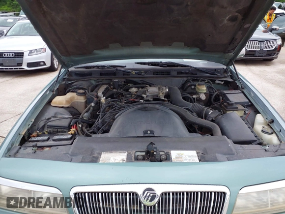 1997 Mercury Grand Marquis GS z VIN 2MELM74W8VX735986, wystawiony jako IAAI lot #42127919 z przebiegiem 135 895 mil mil oraz . Historia ofert i sprzedaży dostępna na DreamBid. Obrazek 10.