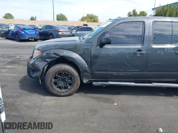 2014 Nissan Frontier SV with VIN 1N6AD0ER8EN756702, listed as a IAAI auction lot 42021294 with 135,143 mi miles and . Bid and sale history available at DreamBid. Image 6.