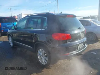 2016 Volkswagen Tiguan S with VIN WVGBV7AX3GW522378, listed as a IAAI auction lot 41391294 with 106,278 mi miles and . Bid and sale history available at DreamBid. Image 14.