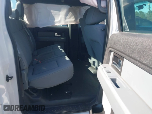 2014 Ford F-150 XL z VIN 1FTFW1CFXEFC26453, wystawiony jako IAAI lot #41490458 z przebiegiem 79 853 mil mil oraz . Historia ofert i sprzedaży dostępna na DreamBid. Obrazek 8.