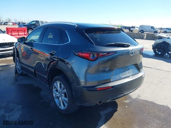 2022 Mazda CX-30 2.5 S Premium Package with VIN 3MVDMBDL9NM447077, listed as a IAAI auction lot 41199286 with NaN miles. Bid and sale history available at carsss.com. Image 3.
