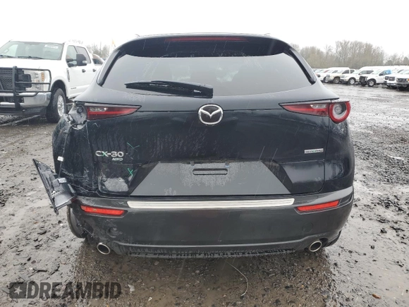 2023 Mazda CX-30 S Preferred with VIN 3MVDMBCM4PM571464, listed as a Copart auction lot 49984875 with 7,721 mi miles and Salvage title. Bid and sale history available at DreamBid. Image 6.