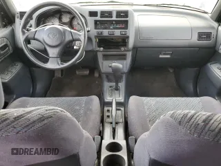 1999 Toyota RAV4 with VIN JT3GP10V0X7054819, listed as a Copart auction lot 44864015 with 140,095 mi miles and Salvage Title. Bid and sale history available at DreamBid. Image 8.