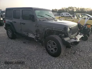 2023 Jeep Wrangler Sport with VIN 1C4HJXDN6PW562491, listed as a Copart auction lot 78252204 with 32,409 mi miles and Salvage Title. Bid and sale history available at DreamBid. Image 4.
