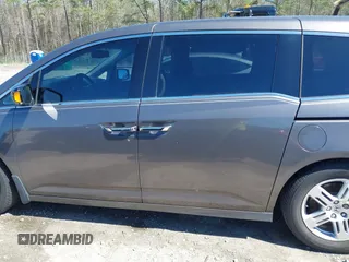 2012 Honda Odyssey Touring with VIN 5FNRL5H91CB057344, listed as a IAAI auction lot 41835272 with 158,854 mi miles. Bid and sale history available at carsss.com. Image 14.
