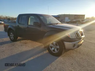 2010 Nissan Frontier SE with VIN 1N6AD0EV6AC404172, listed as a Copart auction lot 83233344 with 301,326 mi miles and Salvage title. Bid and sale history available at DreamBid. Image 4.