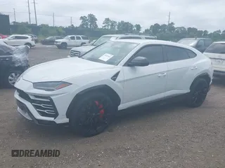 2020 Lamborghini Urus z VIN ZPBUA1ZL9LLA10233, wystawiony jako IAAI lot #39731921 z przebiegiem 41 071 mil mil oraz . Historia ofert i sprzedaży dostępna na DreamBid. Obrazek 2.