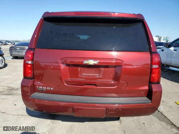 2019 Chevrolet Tahoe LT with VIN 1GNSCBKCXKR261399, listed as a Copart auction lot 46799495 with 74,193 mi miles and Salvage Title. Bid and sale history available at carsss.com. Image 6.