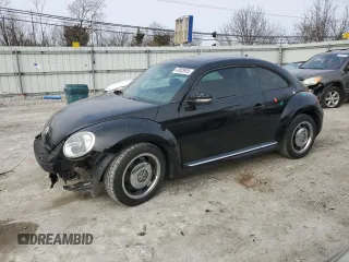 2013 Volkswagen Beetle 2.5L with VIN 3VWJP7ATXDM619335, listed as a Copart auction lot 47023915 with 128,516 mi miles and Salvage Title. Bid and sale history available at DreamBid. Image 1.