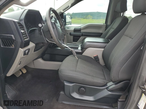 2020 Ford F-150 XL with VIN 1FTEW1E57LKD65489, listed as a Copart auction lot 63264125 with 67,463 mi miles and Salvage title. Bid and sale history available at DreamBid. Image 7.