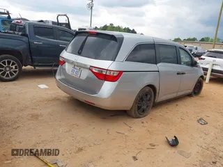 2013 Honda Odyssey LX with VIN 5FNRL5H27DB075559, listed as a IAAI auction lot 42007141 with Not Provided miles and . Bid and sale history available at carsss.com. Image 4.